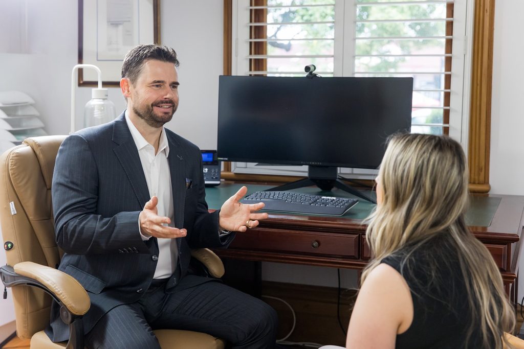 Dr Beldholm seeing patient