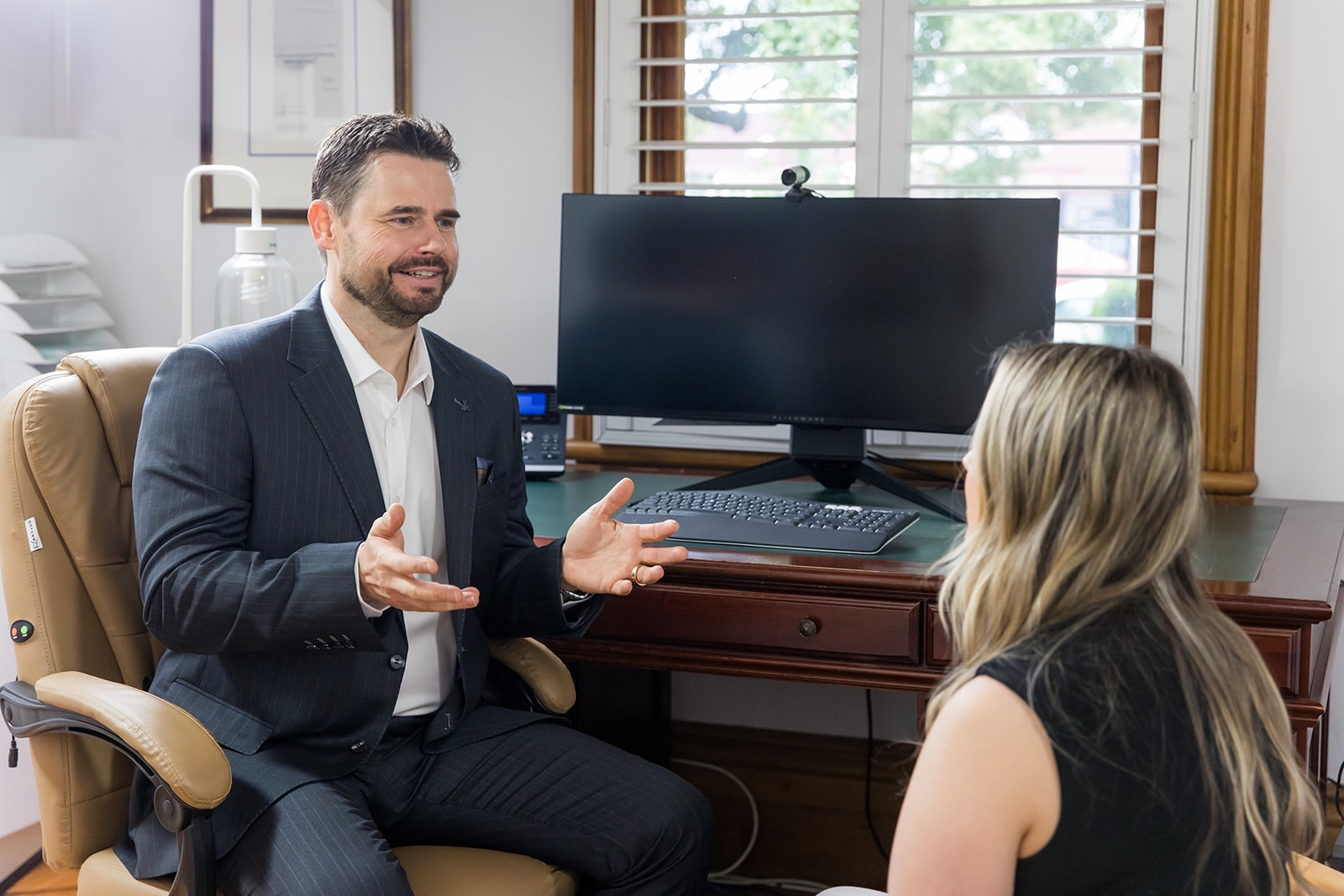 Dr Beldholm seeing patient
